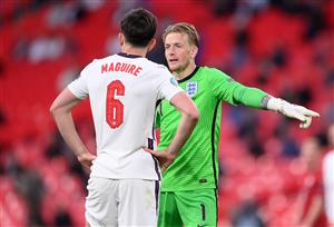 LONDON, ENGLAND - JUNE 22: Jordan Pickford of England interacts with team mate Harry Maguire during the UEFA Euro 2020 Championship Group D match between Czech Republic and England at Wembley Stadium on June 22, 2021 in London, England. (Getty Images)