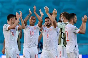 TOPSHOT - Spain's players celebrate their victory after the UEFA EURO 2020 Group E football match between Slovakia and Spain at La Cartuja Stadium in Seville on June 23, 2021. (Getty Images)