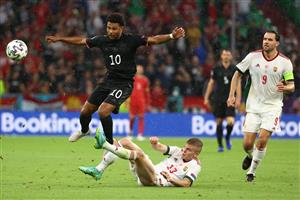 Germany's midfielder Serge Gnabry (L) and Hungary's midfielder Andras Schafer vie for the ball during the UEFA EURO 2020 Group F football match between Germany and Hungary at the Allianz Arena in Munich on June 23, 2021. (Getty Images)