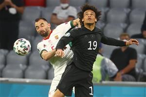 Germany's midfielder Leroy Sane (R) and Hungary's defender Attila Fiola vie for the ball during the UEFA EURO 2020 Group F football match between Germany and Hungary at the Allianz Arena in Munich on June 23, 2021. (Getty Images)