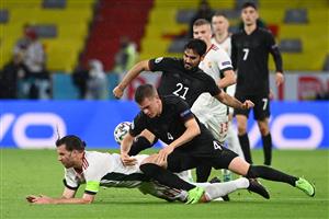 Hungary's forward Adam Szalai (L) and Germany's defender Matthias Ginter vie for the ball during the UEFA EURO 2020 Group F football match between Germany and Hungary at the Allianz Arena in Munich on June 23, 2021. (Getty Images)