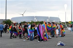 Germany fans are wrapped in Rainbow flags as they gather outside the Allianz Arena ahead of the UEFA EURO 2020 Group F football match between Germany and Hungary, in Munich, on June 23, 2021. (Getty Images)