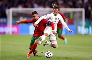 BUDAPEST, HUNGARY - JUNE 23: Cristiano Ronaldo of Portugal battles for possession with Antoine Griezmann of France during the UEFA Euro 2020 Championship Group F match between Portugal and France at Puskas Arena on June 23, 2021 in Budapest, Hungary. (Getty Images)