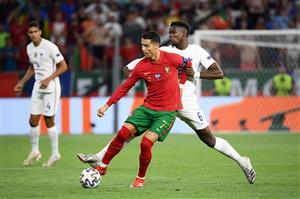 BUDAPEST, HUNGARY - JUNE 23: Cristiano Ronaldo of Portugal is challenged by Paul Pogba of France during the UEFA Euro 2020 Championship Group F match between Portugal and France at Puskas Arena on June 23, 2021 in Budapest, Hungary. (Getty Images)
