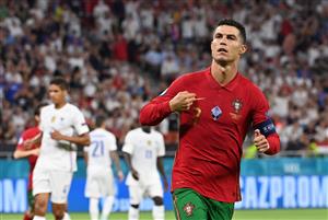 BUDAPEST, HUNGARY - JUNE 23: Cristiano Ronaldo of Portugal celebrates after scoring their side's first goal during the UEFA Euro 2020 Championship Group F match between Portugal and France at Puskas Arena on June 23, 2021 in Budapest, Hungary. (Getty Images)