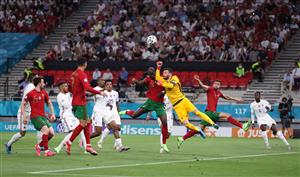BUDAPEST, HUNGARY - JUNE 23: Danilo of Portugal is fouled by Hugo Lloris of France leading to a penalty being awarded during the UEFA Euro 2020 Championship Group F match between Portugal and France at Puskas Arena on June 23, 2021 in Budapest, Hungary. (Getty Images)