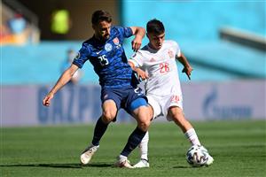 SEVILLE, SPAIN - JUNE 23: Pedri of Spain battles for possession with Jakub Hromada of Slovakia during the UEFA Euro 2020 Championship Group E match between Slovakia and Spain at Estadio La Cartuja on June 23, 2021 in Seville, Spain. (Getty Images)