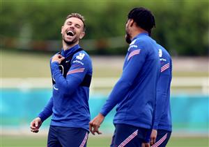 BURTON UPON TRENT, ENGLAND - JUNE 24: Jordan Henderson of England speaks with Tyrone Mings and Conor Coady during an England training session at St George's Park on June 24, 2021 in Burton upon Trent, England. (Getty Images)