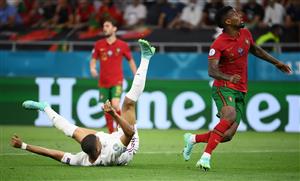 BUDAPEST, HUNGARY - JUNE 23: Kylian Mbappe of France is fouled by Nelson Semedo of Portugal leading to a penalty being awarded during the UEFA Euro 2020 Championship Group F match between Portugal and France at Puskas Arena on June 23, 2021 in Budapest, Hungary. (Getty Images)