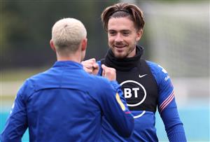 BURTON UPON TRENT, ENGLAND - JUNE 24: Jack Grealish interacts with Phil Foden of England during a training session at St George's Park on June 24, 2021 in Burton upon Trent, England. (Getty Images)