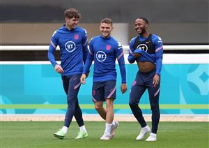 BURTON UPON TRENT, ENGLAND - JUNE 24: John Stones, Kieran Trippier and Raheem Sterling of England share a joke during a training session at St George's Park on June 24, 2021 in Burton upon Trent, England. (Getty Images)