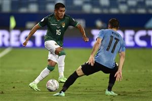CUIABA, BRAZIL - JUNE 24: Erwin Saavedra of Bolivia controls the ball against Matias Viña of Uruguay during a Group A match between Bolivia and Uruguay as part of Copa America Brazil 2021 at Arena Pantanal on June 24, 2021 in Cuiaba, Brazil. (Getty Images)