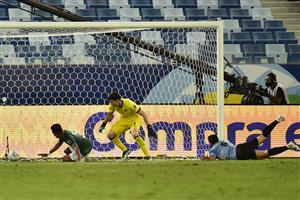 CUIABA, BRAZIL - JUNE 24: Carlos Lampe of Bolivia (C) scores an own goal, the first goal of Uruguay, during a Group A match between Bolivia and Uruguay as part of Copa America Brazil 2021 at Arena Pantanal on June 24, 2021 in Cuiaba, Brazil. (Getty Images)