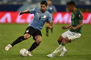 CUIABA, BRAZIL - JUNE 24: Luis Suarez of Uruguay fights for the ball with Roberto Fernandez of Bolivia during a Group A match between Bolivia and Uruguay as part of Copa America Brazil 2021 at Arena Pantanal on June 24, 2021 in Cuiaba, Brazil. (Getty Images)
