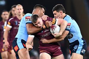 BRISBANE, AUSTRALIA - JUNE 27: Jai Arrow of the Maroons is tackled during game two of the 2021 State of Origin series between the Queensland Maroons and the New South Wales Blues at Suncorp Stadium on June 27, 2021 in Brisbane, Australia. (Photo by Bradley Kanaris/Getty Images)