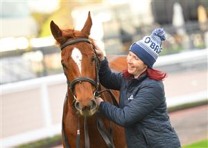 MELBOURNE, AUSTRALIA - JUNE 26: Absolute Flirt and strapper Grace Williams after winning race 6, the Neds Bet Back Handicap, during Melbourne Racing at Caulfield Racecourse on June 26, 2021 in Melbourne, Australia. (Photo by Vince Caligiuri/Getty Images)