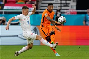 Czech Republic's midfielder Lukas Masopust (L) challenges Netherlands' defender Patrick van Aanholt during the UEFA EURO 2020 round of 16 football match between the Netherlands and the Czech Republic at Puskas Arena in Budapest on June 27, 2021. (Getty Images)