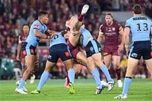 BRISBANE, AUSTRALIA - JUNE 27: Cameron Murray of the Blues tackles a Maroons player during game two of the 2021 State of Origin series between the Queensland Maroons and the New South Wales Blues at Suncorp Stadium on June 27, 2021 in Brisbane, Australia. (Photo by Bradley Kanaris/Getty Images)