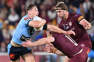 BRISBANE, AUSTRALIA - JUNE 27: Cameron Murray of the Blues is tackled during game two of the 2021 State of Origin series between the Queensland Maroons and the New South Wales Blues at Suncorp Stadium on June 27, 2021 in Brisbane, Australia. (Photo by Bradley Kanaris/Getty Images)