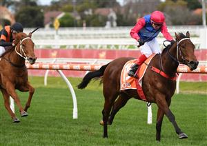 MELBOURNE, AUSTRALIA - JUNE 26: Dean Yendall riding Hai Sun winning Race 2, the Neds Protest Payout Handicap, during Melbourne Racing at Caulfield Racecourse on June 26, 2021 in Melbourne, Australia. (Photo by Vince Caligiuri/Getty Images)