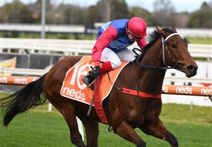 MELBOURNE, AUSTRALIA - JUNE 26: Dean Yendall riding Hai Sun winning Race 2, the Neds Protest Payout Handicap, during Melbourne Racing at Caulfield Racecourse on June 26, 2021 in Melbourne, Australia. (Photo by Vince Caligiuri/Getty Images)