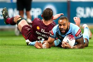 BRISBANE, AUSTRALIA - JUNE 27: Josh Addo-Carr of the Blues dives over to score a try during game two of the 2021 State of Origin series between the Queensland Maroons and the New South Wales Blues at Suncorp Stadium on June 27, 2021 in Brisbane, Australia. (Photo by Chris Hyde/Getty Images)