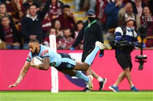 BRISBANE, AUSTRALIA - JUNE 27: Josh Addo-Carr of the Blues dives over to score a try during game two of the 2021 State of Origin series between the Queensland Maroons and the New South Wales Blues at Suncorp Stadium on June 27, 2021 in Brisbane, Australia. (Photo by Chris Hyde/Getty Images)