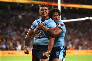 BRISBANE, AUSTRALIA - JUNE 27: Latrell Mitchell of the Blues celebrates after scoring a try with Brian To'o of the Blues during game two of the 2021 State of Origin series between the Queensland Maroons and the New South Wales Blues at Suncorp Stadium on June 27, 2021 in Brisbane, Australia. (Photo by Chris Hyde/Getty Images)
