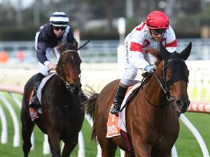 MELBOURNE, AUSTRALIA - JUNE 26: Luke Currie riding Ballet Master winning Race 4, the Neds Price Boost Handicap, during Melbourne Racing at Caulfield Racecourse on June 26, 2021 in Melbourne, Australia. (Photo by Vince Caligiuri/Getty Images)