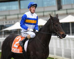 MELBOURNE, AUSTRALIA - JUNE 26: Mark Zahra riding Jigsaw after winning Race 1, the Unleash Your Neds Toolbox Handicap, during Melbourne Racing at Caulfield Racecourse on June 26, 2021 in Melbourne, Australia. (Photo by Vince Caligiuri/Getty Images)