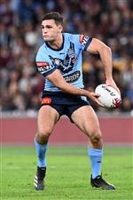 BRISBANE, AUSTRALIA - JUNE 27: Nathan Cleary of the Blues offloads the ball during game two of the 2021 State of Origin series between the Queensland Maroons and the New South Wales Blues at Suncorp Stadium on June 27, 2021 in Brisbane, Australia. (Photo by Bradley Kanaris/Getty Images)
