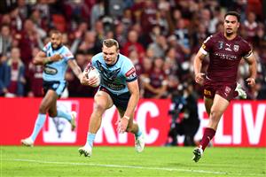 BRISBANE, AUSTRALIA - JUNE 27: Tom Trbojevic of the Blues dives over to score a try during game two of the 2021 State of Origin series between the Queensland Maroons and the New South Wales Blues at Suncorp Stadium on June 27, 2021 in Brisbane, Australia. (Photo by Chris Hyde/Getty Images)
