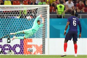 TOPSHOT - France's midfielder Paul Pogba (R) watches his shot go into the net of Switzerland's goalkeeper Yann Sommer for the third goal during the UEFA EURO 2020 round of 16 football match between France and Switzerland at the National Arena in Bucharest on June 28, 2021. (Getty Images)