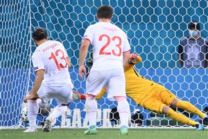 France's goalkeeper Hugo Lloris (back) dives to save a penalty by Switzerland's defender Ricardo Rodriguez (L) during the UEFA EURO 2020 round of 16 football match between France and Switzerland at the National Arena in Bucharest on June 28, 2021. (Getty Images)