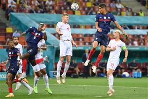 France's defender Raphael Varane (2R) attempts a shot on goal during the UEFA EURO 2020 round of 16 football match between France and Switzerland at the National Arena in Bucharest on June 28, 2021. (Getty Images)