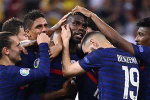 TOPSHOT - France's midfielder Paul Pogba (C) celebrates with teammates after scoring the third goal during the UEFA EURO 2020 round of 16 football match between France and Switzerland at the National Arena in Bucharest on June 28, 2021. (Getty Images)