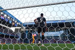Croatia's defender Duje Caleta-Car picks up the ball after Spain's third goal during the UEFA EURO 2020 round of 16 football match between Croatia and Spain at the Parken Stadium in Copenhagen on June 28, 2021. (Getty Images)