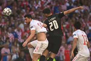 Spain's defender Aymeric Laporte (L) vies with Croatia's forward Bruno Petkovic during the UEFA EURO 2020 round of 16 football match between Croatia and Spain at the Parken Stadium in Copenhagen on June 28, 2021. (Getty Images)