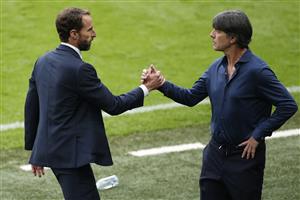 Germany's coach Joachim Loew (R) greets England's coach Gareth Southgate at the end of the UEFA EURO 2020 round of 16 football match between England and Germany at Wembley Stadium in London on June 29, 2021. (Getty Images)