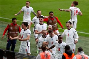 England's forward Raheem Sterling (R) celebrates after scoring the first goal during the UEFA EURO 2020 round of 16 football match between England and Germany at Wembley Stadium in London on June 29, 2021. (Getty Images)