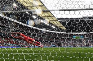 TOPSHOT - Germany's goalkeeper Manuel Neuer dives to save a shot from England's forward Raheem Sterling during the UEFA EURO 2020 round of 16 football match between England and Germany at Wembley Stadium in London on June 29, 2021. (Getty Images)