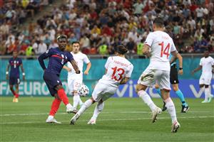 BUCHAREST, ROMANIA - JUNE 28: Paul Pogba of France shoots whilst under pressure from Ricardo Rodriguez of Switzerland during the UEFA Euro 2020 Championship Round of 16 match between France and Switzerland at National Arena on June 28, 2021 in Bucharest, Romania. (Getty Images)