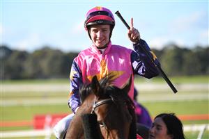 MELBOURNE, AUSTRALIA - JUNE 30: Matthew Cartwright riding Can't Be Done after winning race 5, the Ladbrokes Bet Ticker Handicap, during Melbourne Racing at Sandown Lakeside on June 30, 2021 in Melbourne, Australia. (Photo by Vince Caligiuri/Getty Images)