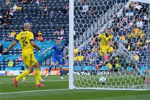 Ukraine's defender Oleksandr Zinchenko (2L) scores the opening goal during the UEFA EURO 2020 round of 16 football match between Sweden and Ukraine at Hampden Park in Glasgow on June 29, 2021. (Getty Images)