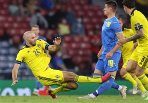 TOPSHOT - Sweden's defender Marcus Danielsson (L) fouls Ukraine's forward Artem Besedin (C) to earn a red card and get sent off during the UEFA EURO 2020 round of 16 football match between Sweden and Ukraine at Hampden Park in Glasgow on June 29, 2021. (Getty Images)