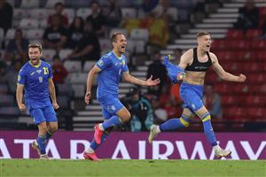 Ukraine's forward Artem Dovbyk (R) celebrates scoring their second goal during the UEFA EURO 2020 round of 16 football match between Sweden and Ukraine at Hampden Park in Glasgow on June 29, 2021. (Getty Images)