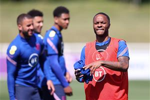 Raheem Sterling of England holds a training bib during the England Training Session. (Getty Images)