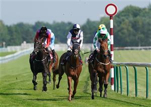NEWTON-LE-WILLOWS, ENGLAND - JULY 01: Albert Camus ridden by Robert Havlin (C) coming home to win the racingtv.com Handicap at Haydock Park Racecourse on July 1, 2021 in Newton-le-Willows, England. (Photo by Martin Rickett - Pool/Getty Images)