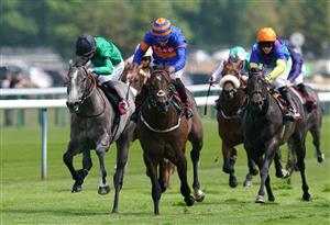 NEWTON-LE-WILLOWS, ENGLAND - JULY 01: Oneforthegutter and Dougie Costello (centre, blue/orange) coming home to win the EBF Stallions Maiden Stakes at Haydock Park Racecourse on July 1, 2021 in Newton-le-Willows, England. (Photo by Martin Rickett - Pool/Getty Images)