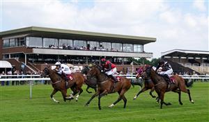 NEWTON-LE-WILLOWS, ENGLAND - JULY 01: Dapper Man and Saffie Osborne (left) coming home to win the Haydock Apprentice Training Series Handicap at Haydock Park Racecourse on July 1, 2021 in Newton-le-Willows, England. (Photo by Martin Rickett - Pool/Getty Images)